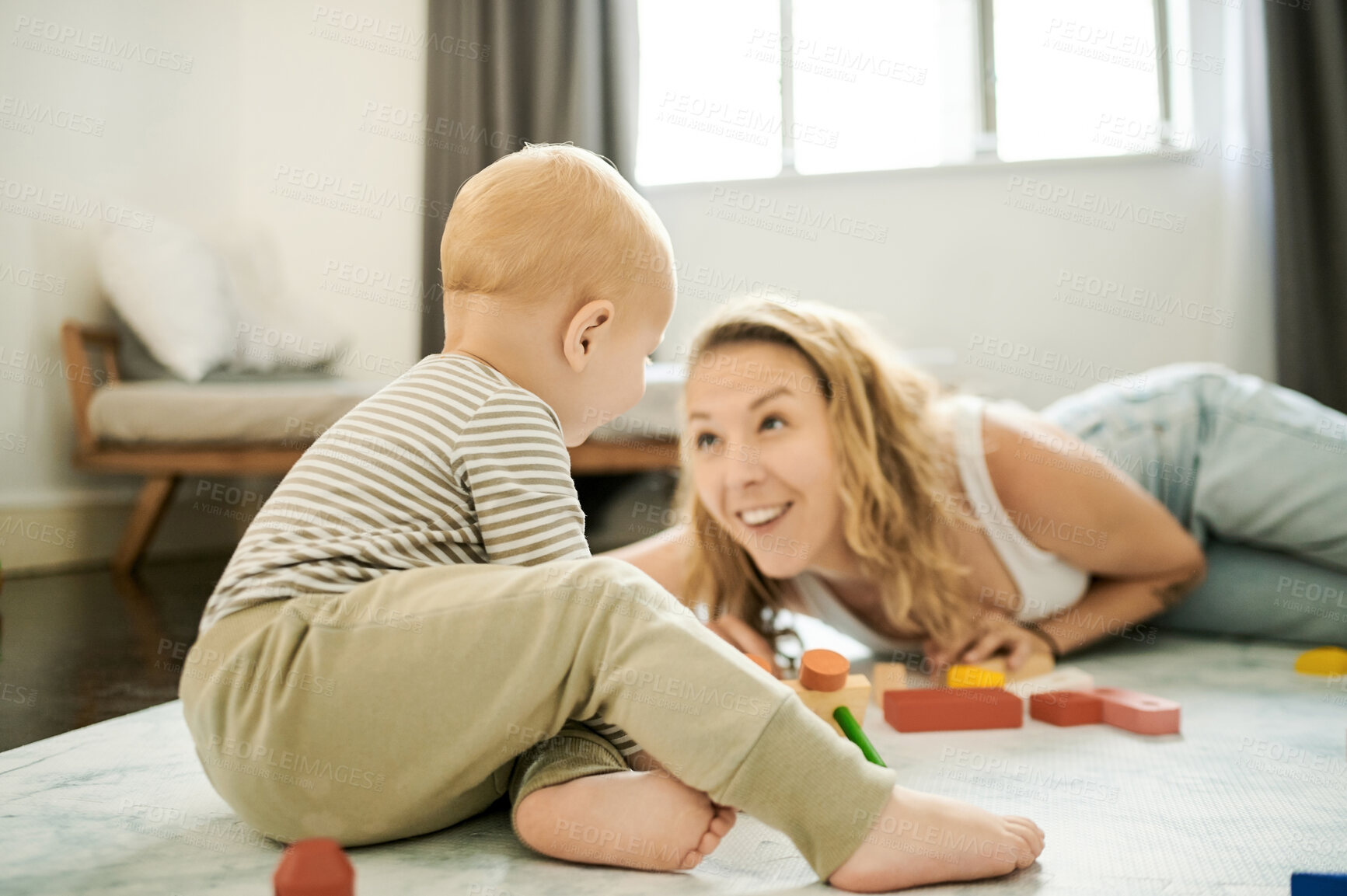 Buy stock photo Building blocks, learning and toys with mother and child playing in family home bedroom for fun. Woman or mom with toddler kid together for happiness, quality time and mobility or growth development
