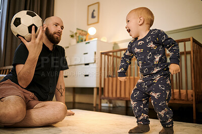 Buy stock photo Family, father and son with a ball, playing and bonding at home, happiness and relax together. Parent, dad and boy with joy, football and wellness with a smile, kid and game for fun, cheerful and joy