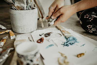 Buy stock photo Paint tube, paper and hands mixing color, creative person in studio and watercolor supplies closeup. Art, talent and painting process in workshop with painter and artist with tools for creativity