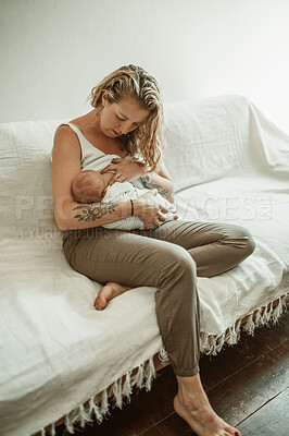 Buy stock photo Breastfeeding, baby and mother on a couch, care and nurture with happiness, home and love. Female parent, mama and newborn on a sofa, maternity and child development with a hungry kid, lounge and mom