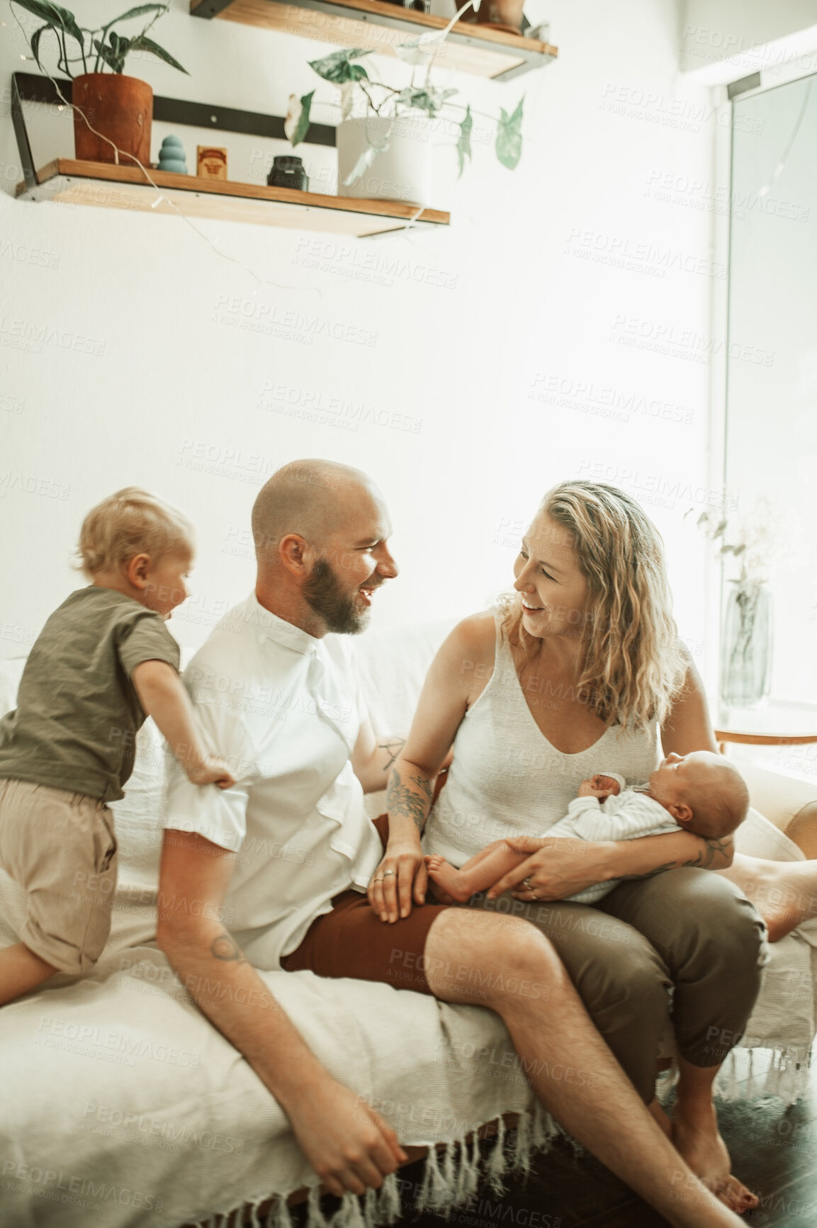 Buy stock photo Parents, children and a family having fun on the sofa in the living room of their home together for bonding. Mother, father and kids in the house with a baby and cute boy child playing in the lounge