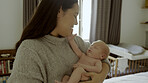 Happy, newborn and mother with baby as love, care or bonding in a home as affection together. Sleeping, support and mom relax in bedroom with kid as family in house for childcare and comfort