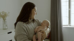 Love, care and young woman with her baby in the nursery of the modern family house together. Sweet, cute and mother holding her infant, newborn or child in bedroom for sleeping, nap or rest at home.