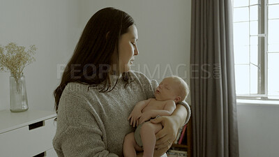 Buy stock photo Love, care and young woman with her baby in the nursery of the modern family house together. Sweet, cute and mother holding her infant, newborn or child in bedroom for sleeping, nap or rest at home.