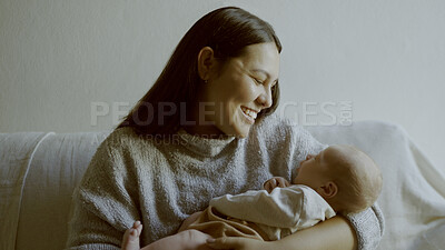 Buy stock photo Mother, love and newborn bonding in arms for care and relax on sofa in lounge of family home with smile. Happiness, woman and baby sleeping for development and growth on couch in living room of house