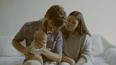 Buy stock photo Relax, mom or dad with a newborn in a happy family to bond together for child development. Living room, parents or proud father with mother or baby infant for love, safety or trust on sofa in home