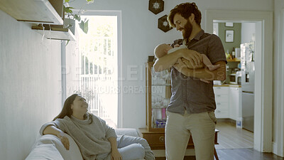 Buy stock photo Mother, hug or father with newborn in a happy family for care, love or bond together for child development. Smile, relax or dad with mom or infant baby for support, trust or comfort in lounge at home