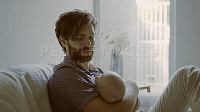 Buy stock photo Love, hug or father with baby on sofa for care or bonding together to nurture child development. Home, newborn or single parent dad with infant for support, trust or comfort in family house to relax