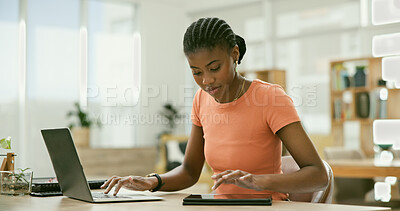 Buy stock photo Black woman, laptop and tablet for office job, employee and working for copywriter career. Businesswoman, serious or person for occupation, workplace and social media marketing for advertising agency
