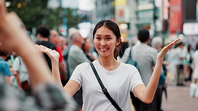 Buy stock photo Tourist, woman and happy with photography in city for travel memory, sightseeing and social media post. Japanese person, smile and showing town in picture for holiday adventure and vacation location