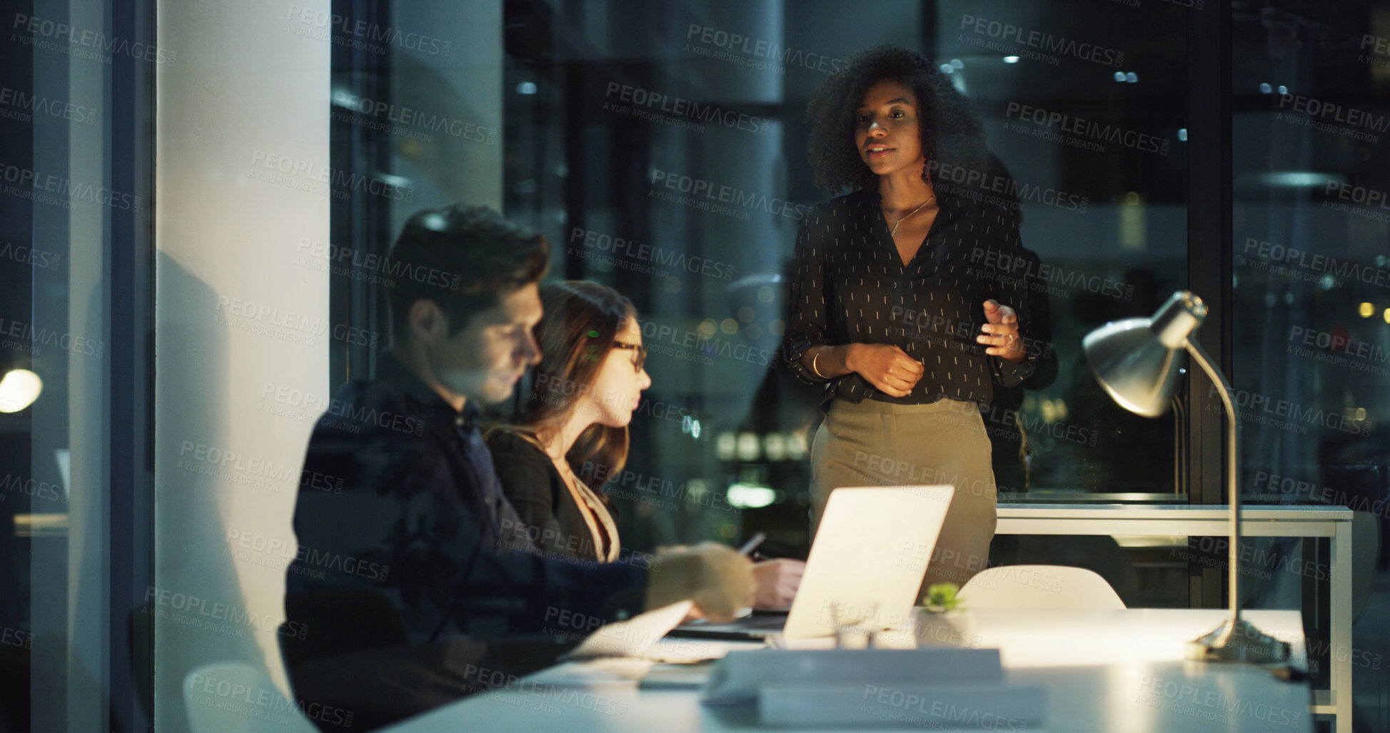 Buy stock photo Business people, night and meeting with laptop, planning and brainstorming for legal project and research. Lawyer, consultant and employee with discussion, book and deadline with idea for case notes