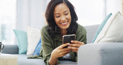Buy stock photo Happy, browsing and woman with smartphone, relax and funny videos on social media, lounge and break. House, scroll and entertainment for person with app, living room and comfortable in weekend
