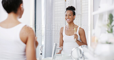 Buy stock photo Woman, toothbrush and mirror cleaning in home, oral hygiene practice and morning routine in bathroom. Female person, gum care and treatment to prevent plaque or cavity, fresh breath and dental health