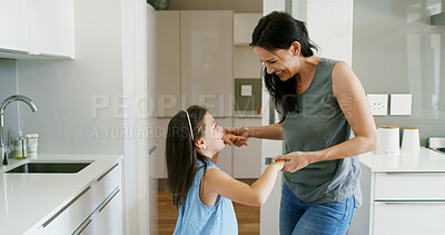 Buy stock photo Mother, child and happy with dancing in kitchen for celebration, connection and learning steps. Bonding, woman dancer and girl kid in home with moving together for weekend entertainment and support