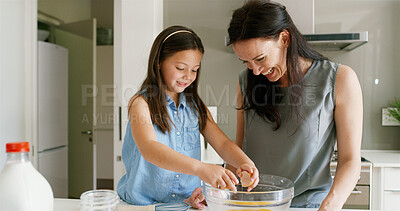 Buy stock photo Mother, child and learning to bake in kitchen with egg preparation, bonding and support with laughing. Woman, girl kid and happy with cooking in home for culinary skills, teaching cake recipe and fun