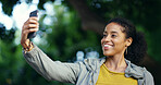 Selfie, smile and travel with happy woman at park for commute, holiday or vacation in nature. App, photograph and social media with tourism influencer outdoor for adventure or sightseeing abroad