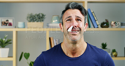 Buy stock photo Sick, tissue and sad man in home with blocked nose for infection, flu virus or cold symptoms. Depressed, upset and person crying with fatigue, frustrated and stress for hayfever, sinusitis or allergy
