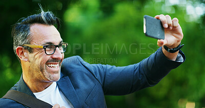 Buy stock photo Mature, happy man and selfie with picture in nature for photography, travel or outdoor memory. Male person, business tourist or post with smile for capture moment, social media or online app at park