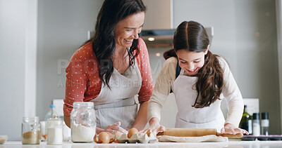 Buy stock photo Mother, girl and baking with home, kitchen and learning with ingredients for pastry or dessert or cake. Happy, woman and daughter help teaching for cooking pudding, bread or bakery recipe in house