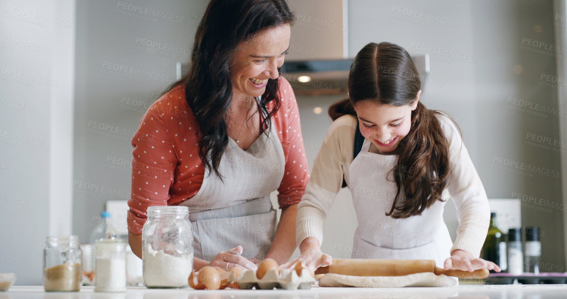 Buy stock photo Mother, girl and baking with home, kitchen and learning with ingredients for pastry or dessert or cake. Happy, woman and daughter help teaching for cooking pudding, bread or bakery recipe in house