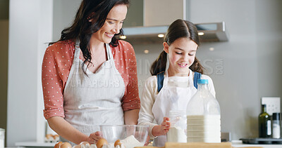 Buy stock photo Mother, girl and baking with smile, kitchen and learning with ingredients for pastry and dessert or bread. Happy, woman and daughter help teaching for cooking pudding, cake or bakery recipe in house