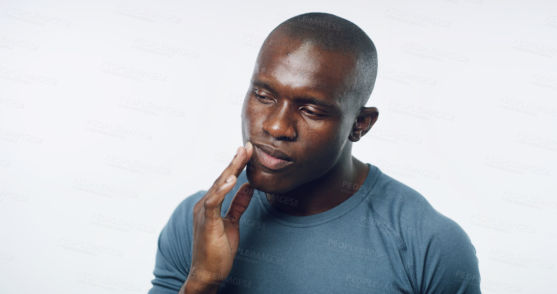 Buy stock photo Hand, pain and black man with toothache in studio for dental injury, gingivitis or cavity. Oral health, sick and African person with sore for gum disease, abscess or wisdom teeth by white background.