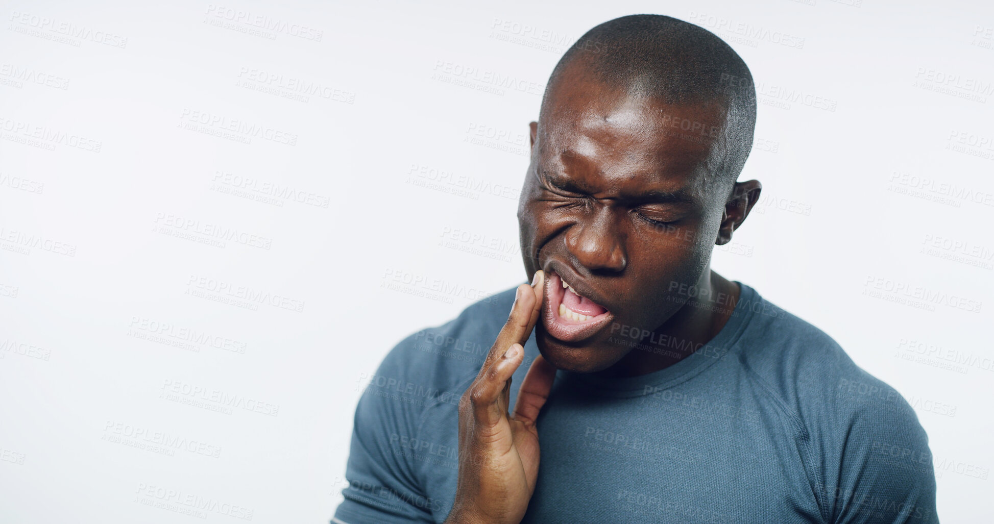 Buy stock photo Hand, oral health and black man with toothache in studio for dental injury, gingivitis or cavity. Pain, sick and African person with sore for gum disease, abscess or wisdom teeth by white background.