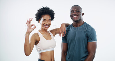 Buy stock photo Okay sign, fitness and portrait of couple in studio for workout, exercise and training on white background. Sports, African and man and woman with success emoji for agreement, thank you and approve