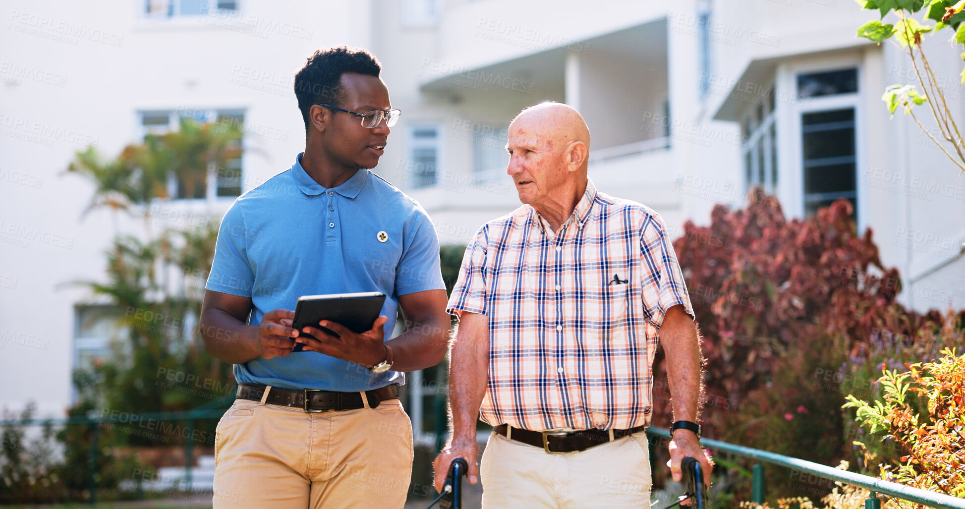 Buy stock photo Clinic, nurse and tablet with old man walking outdoor for healthcare report, support and Alzheimer schedule. Medical research and online with person at nursing home for caregiver, insurance and help