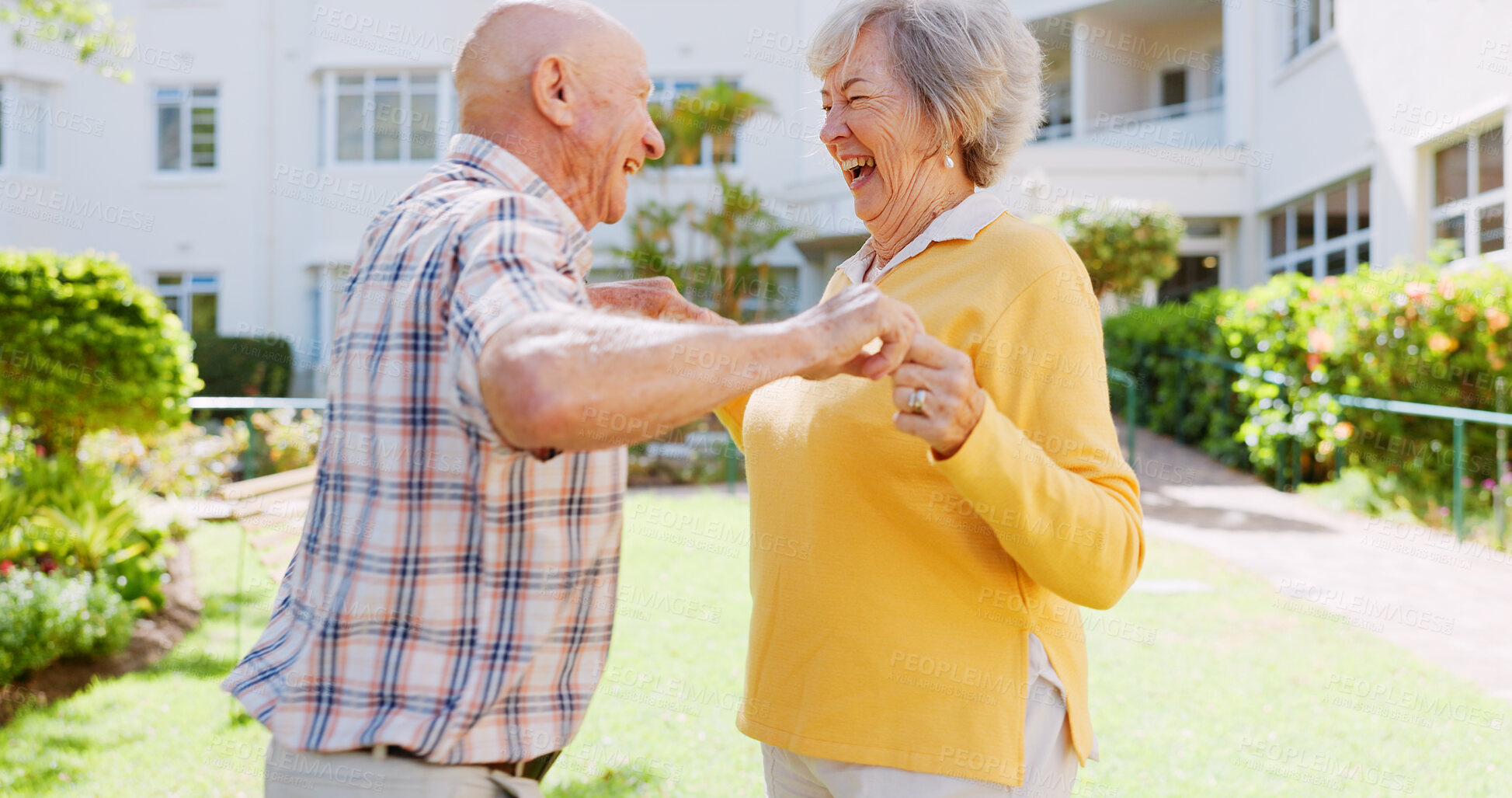 Buy stock photo Old couple, outdoor and holding hands for happy dancing, support and love in relationship. People, nature and elderly bonding in retirement for security, date together and laughing for fun outside