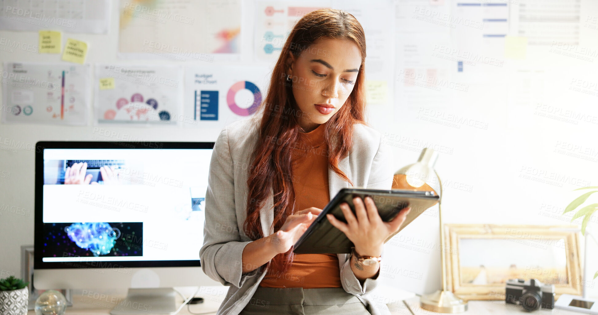 Buy stock photo Typing, reading and tablet with business woman in office for research, company shares and profit margin. Data report, finance growth and infographic with person in agency for statistics and chart