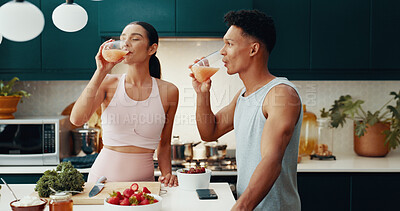 Buy stock photo Couple, drinking and juice of fitness at house of healthy meal, nutrition diet and bonding together. People, cooking and vegan drink of gut health, morning detox and weight loss of brunch ingredients