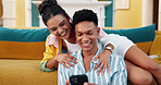 Couple, couch and phone with smile, home date and happy for web blog, movie or funny meme in living room. Man, woman and digital technology with comic laugh for social media post or bonding in lounge