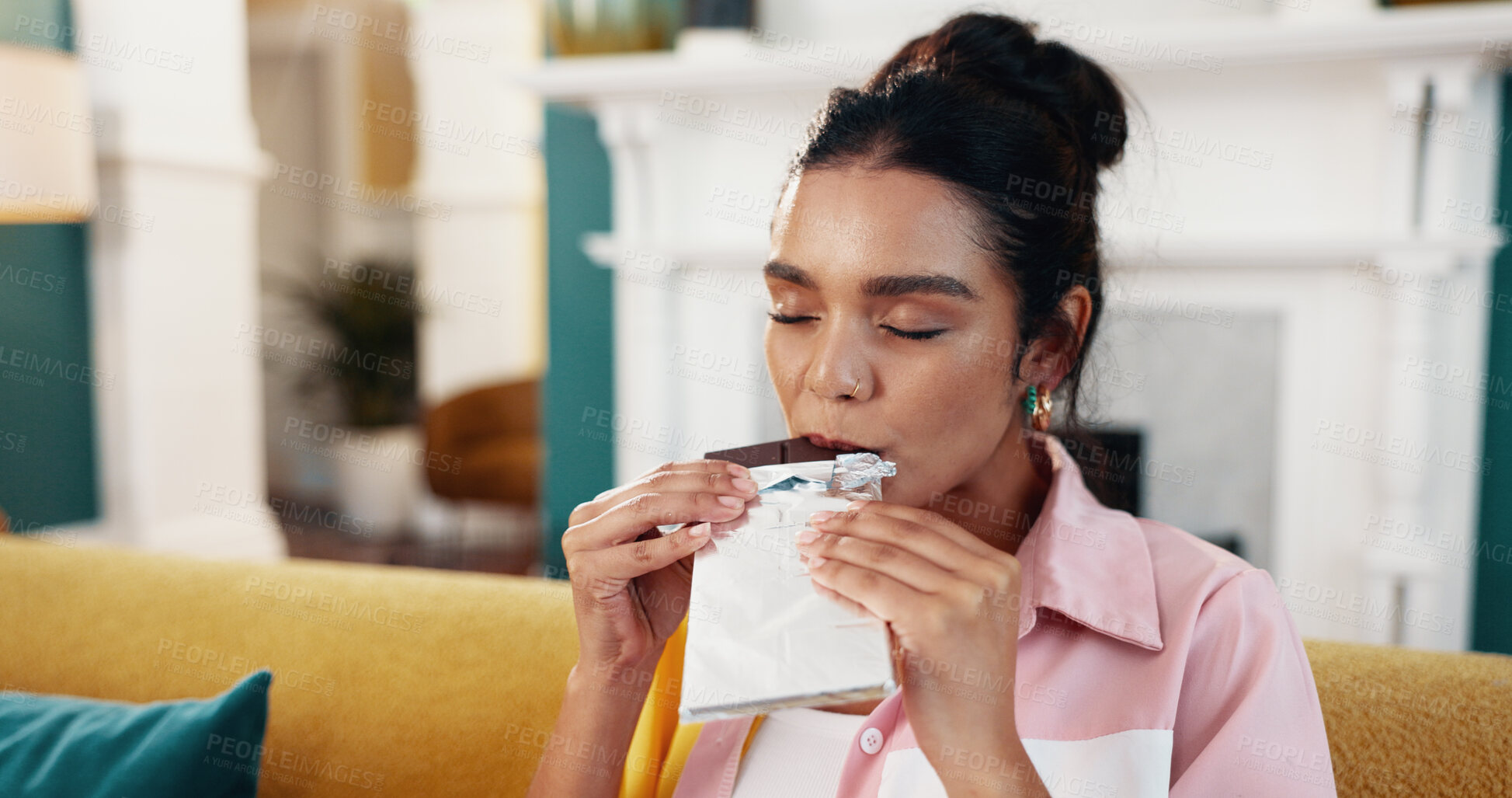 Buy stock photo Woman, chocolate peace and relax in home, comfort food and craving cacao nutrition in living room. Female person, eyes closed and sweet sugar snack to enjoy, dessert and bite of dark gourmet candy