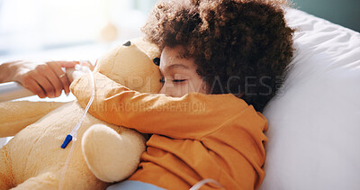 Buy stock photo Child sleeping, hospital bed and hug teddy bear for recovery, immune system support and pediatrics. Boy, diagnosis facility and resting in clinic for treatment, service and embrace toy for comfort