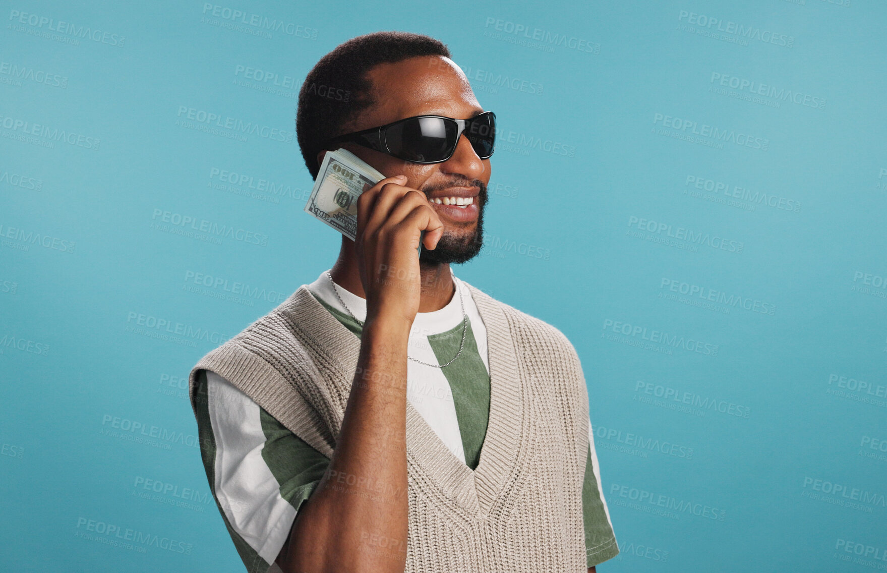 Buy stock photo Smile, cash and black man with sunglasses, money and winner on blue studio background. African person, dollars and model with shades, funky eyewear and finance with stock market payment or investment