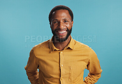 Buy stock photo Confident, portrait and man with smile, studio and positive mindset for career growth, creative and business. Blue background, mockup space and black person with opportunity, writer or happy in Kenya