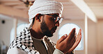 Religion, prayer hands and Muslim man in Mosque for praying, worship and faith in religious building. Spiritual, Allah and person in temple for Ramadan Kareem blessing, culture and Islamic belief