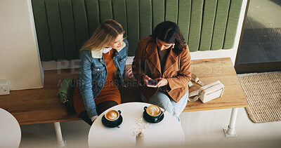 Buy stock photo Women, friends and above with phone at cafe with scroll, video and share post on social media. Girl, people and relax with smartphone, cappuccino and reunion with chat on mobile app at coffee shop