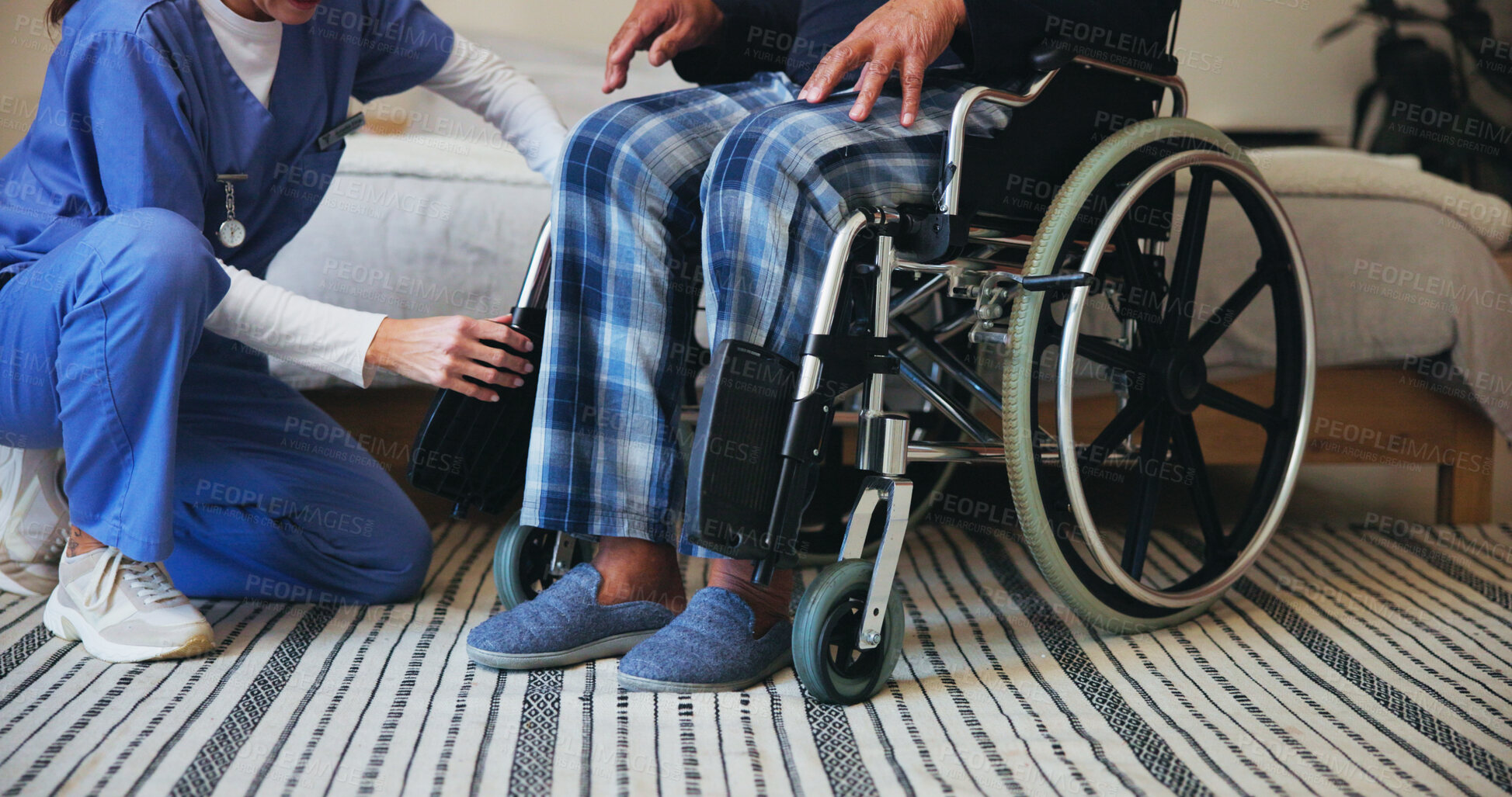 Buy stock photo Hands, caregiver or shoes with wheelchair for support, elderly care or assisted living at retirement or old age home. Closeup, nurse or volunteer helping person with a disability for mobility or walk