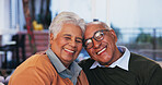 Happy, love and portrait of senior couple relaxing in home for bonding, marriage and connection. Smile, care and elderly man and woman on sofa with commitment together in living room at house.