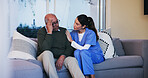 Checkup, comfort and nurse with senior man on sofa in retirement home for dementia diagnosis. Empathy, compassion and caregiver with elderly patient for medical emotional support at assisted living.