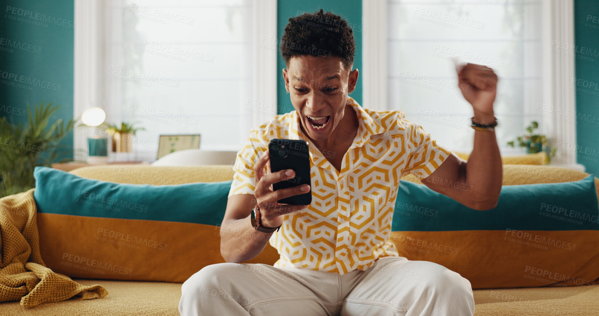 Buy stock photo Man, winner and surprise with phone for good news, college acceptance and success in home. Achievement, victory and opportunity with student in living room for university scholarship, results and wow