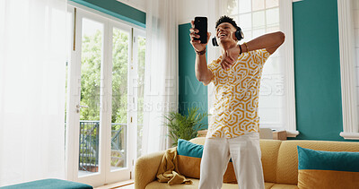 Buy stock photo Man, winner and celebration dance, smartphone for good news and college acceptance in home. Achievement, victory and opportunity with student in living room for university scholarship and music