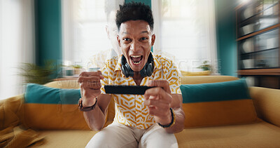 Buy stock photo Excited man, portrait or winning race with phone for esport competition or mobile gaming on sofa at home. Happy, male person or gamer with victory or rank for speed simulation or virtual championship