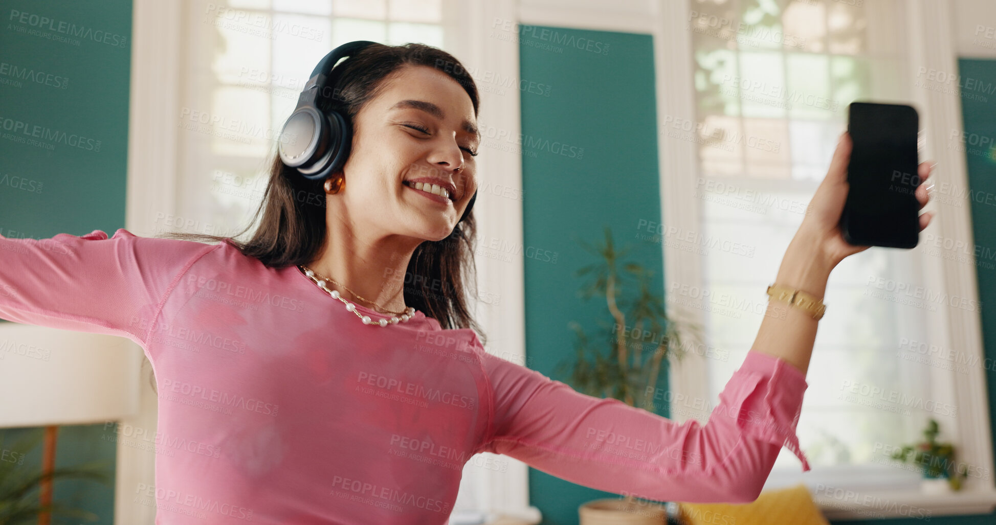 Buy stock photo Woman, winner and celebration dance, smartphone for good news and college acceptance in home. Achievement, victory and opportunity with student in living room for university scholarship and music