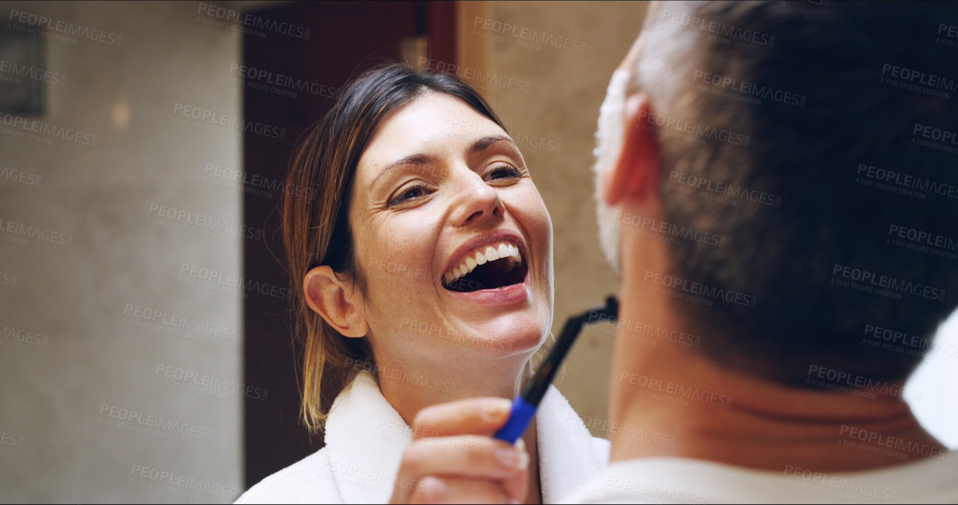 Buy stock photo Couple, shaving and laughing with playful fun and joking together in home bathroom. Love, shave help and grooming with man, woman and skincare routine for morning bonding and hygiene treatment