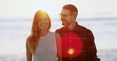 Buy stock photo Couple, smile and love at ocean outdoor of anniversary, summer vacation and bonding together. Happy, people and lens flare with getaway trip, romantic date and marriage commitment for tropical travel