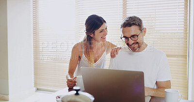 Buy stock photo Couple, smile and laptop in kitchen, breakfast and relax with coffee, streaming or social network in home. Mature man, woman and happy with computer, tea and watch video with subscription in house