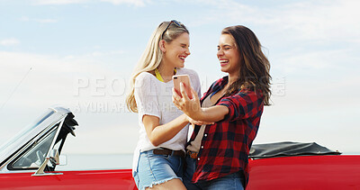 Buy stock photo Road trip, friends laughing and selfie by car for travel, vacation or holiday outdoor on gap year. Convertible transport, happy women or picture on journey for funny memory or silly social media post